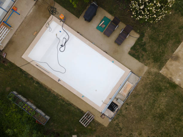 istock aerial drone flight over pool which is just left out and cleaned 1396609548