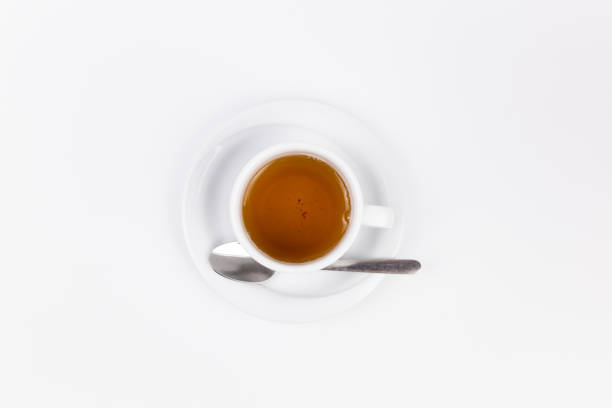 istock white porcelain cup with tea for tomorrow on the table with a saucer 1396610548
