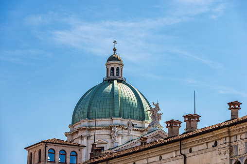 Close-up of the New Cathedral of Santa Maria Assunta, 1604-1825 in Brescia downtown, in late Baroque style, also called Duomo nuovo (New Cathedral) view from the Piazza della Loggia. Cathedral square or Paolo VI square. Lombardy, Italy, Europe.