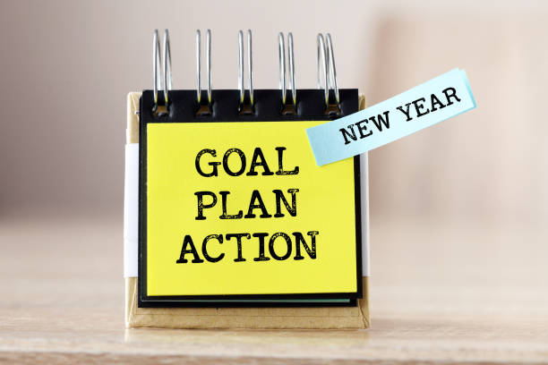 istock New year, goal, plan, action text on notebook.Business motivation, inspiration concepts 1396615093