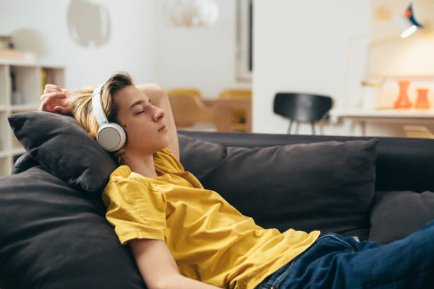 istock teenager boy at home 1396617962