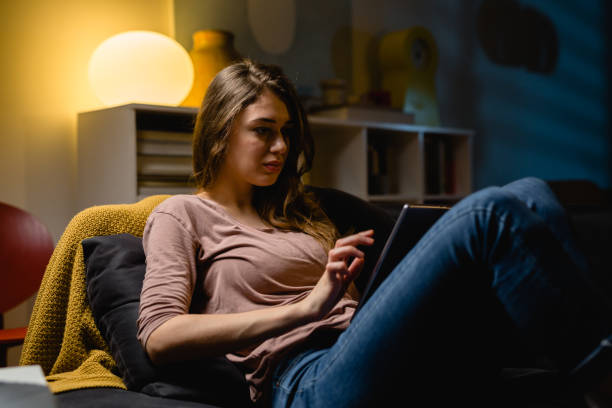 istock woman relaxing at home 1396618217
