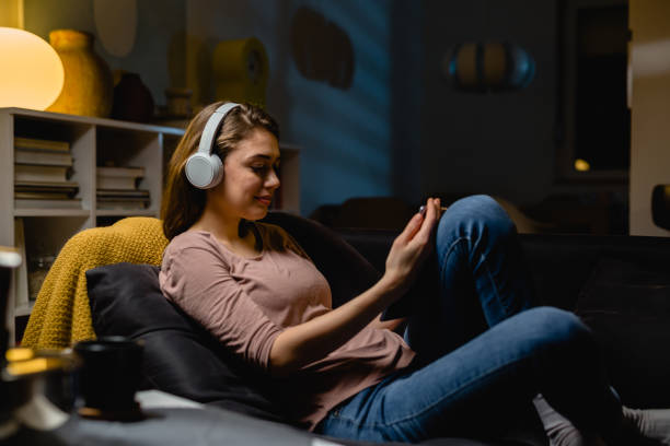 istock woman relaxing at home 1396618270