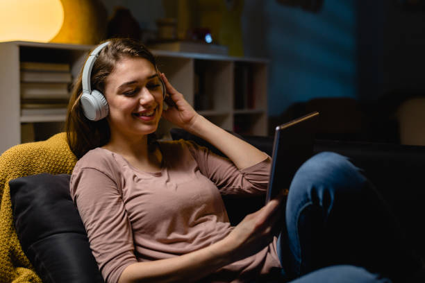istock woman relaxing at home 1396618272