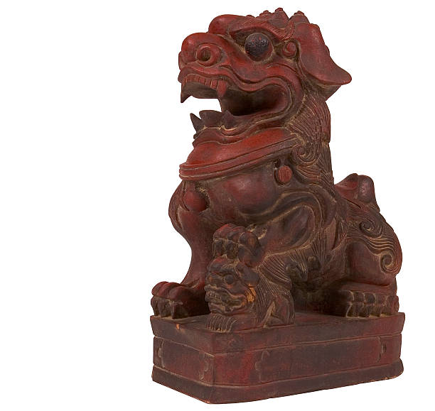 Red Chinese Foo Dog Aged Cinese Foo dog usually seen at entrance to shrines chinese temple dog stock pictures, royalty-free photos & images