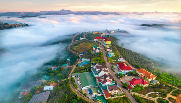 Aerial view of the town in the early morning mist stock photo