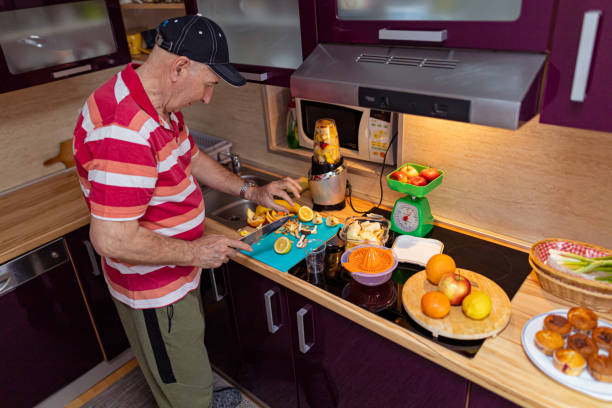 istock Senior man preparing vegan meal 1396624626
