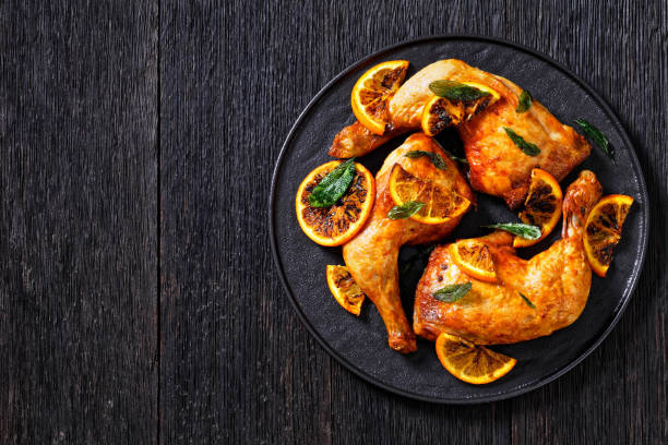 istock Grilled Orange roast Chicken legs with sage 1396626786
