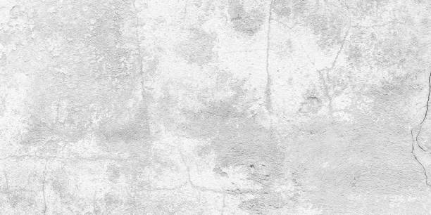 Weathered cement wall surface, abstract light gray backgrounds. Concrete grunge texture with white stucco, plaster. Loft style. Copy, text space. stock photo