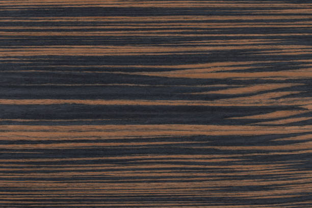 istock Brown and Black Ebony Makassar Wood Background 1396627735