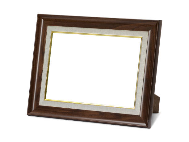 istock wooden desktop picture frame isolated on white 1396627792