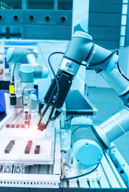istock Automatic industrial robotic robot working, industry 4.0 and technology concept 1396628894