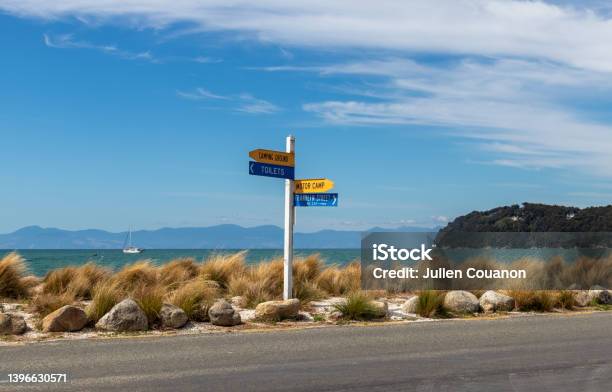 Road Sign At Abel Tasman National Park Stock Photo - Download Image Now - Abel Tasman National Park, Landscape - Scenery, New Zealand