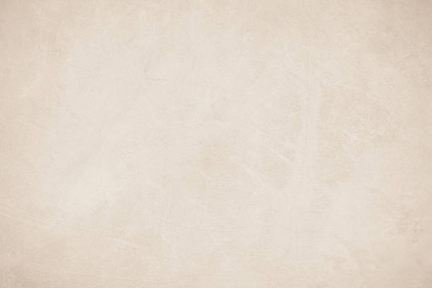 istock Old concrete wall texture background. Close up retro plain beige color cement material surface rough for show or advertise promote product content on display and brown paper design element concept. 1396631251