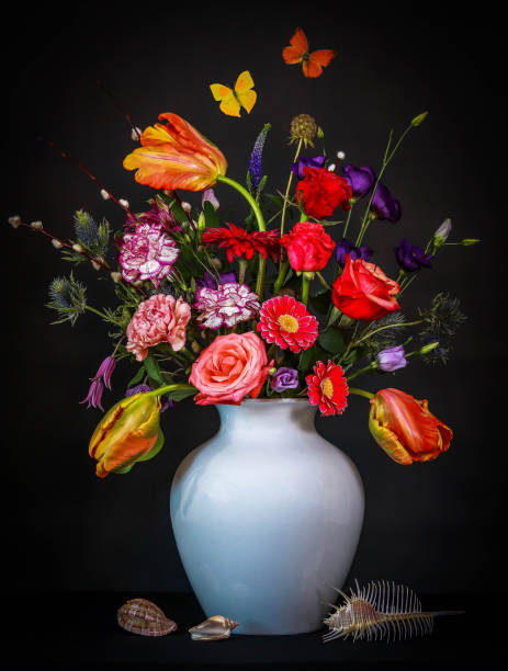 istock Still Life with Tulips, Shells and Butterflies 1396632108