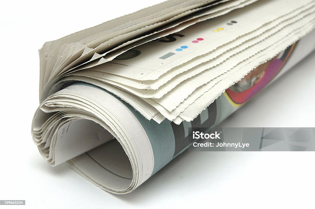 Rollo de periódico - Foto de stock de Enrollado libre de derechos