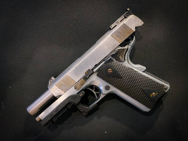 istock Old and dirty pistol gun 1396636611