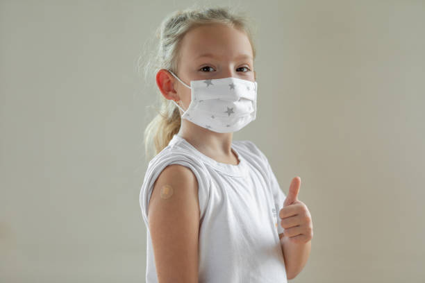 istock Showing plaster on shoulder after injection 1396638880