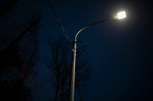 Street lighting. Lamp on pole. Light in park.