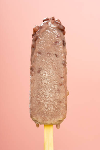 istock red bean popsicle melting on a pink background 1396642206