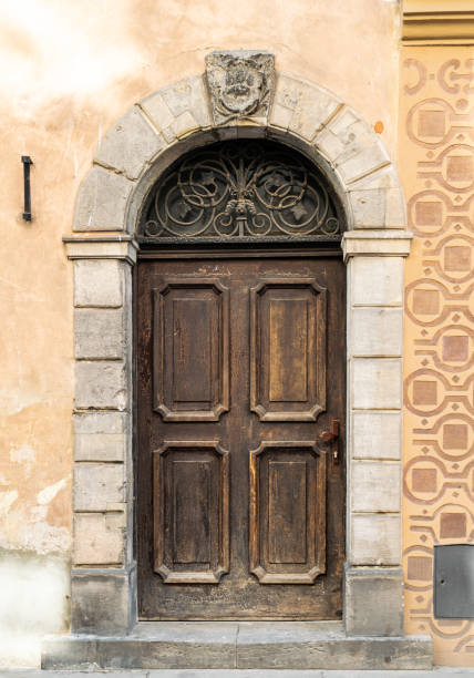istock Carved wooden old door 1396643104