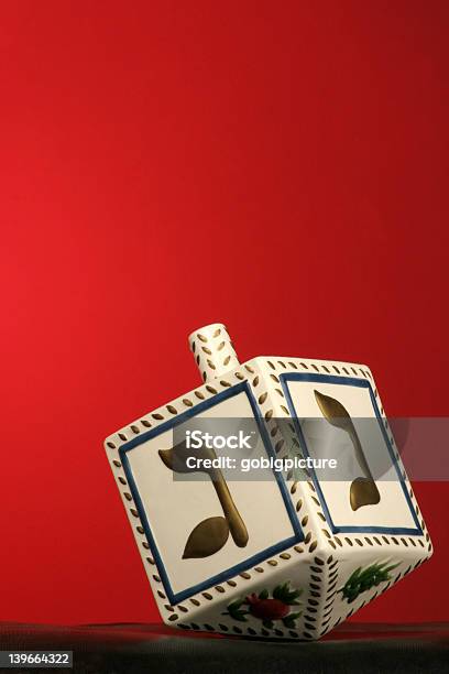 Chanukkah Dreidel Stock Photo - Download Image Now - Dreidel, Gold Colored, Blue