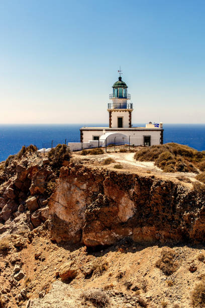 istock Old lighthouse on the sea shore. 1396644428