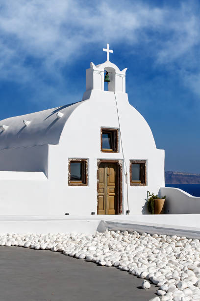 istock White church in Oia, Santorini, Greece. 1396644437