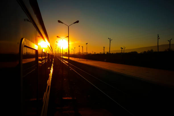 istock Passenger train waiting for departure in the station during sunset 1396646758