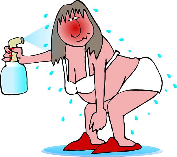 Hot Flash This illustration depicts a woman stripped to her underwear, having a hot flash and spraying herself with water. sweating cartoons stock illustrations