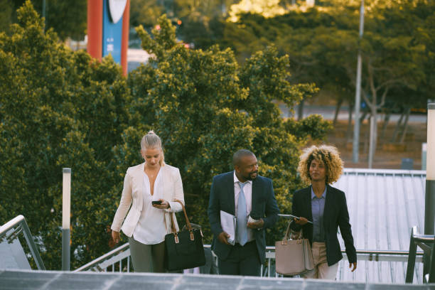 istock Colleagues walking up the stairs 1396648577