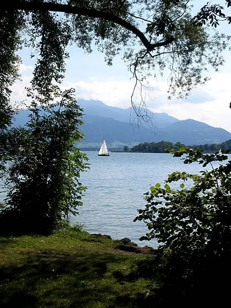 Summer in Bavaria. A little sailing-ship at the "Chiemsee"