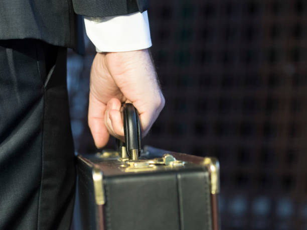 istock person in suit with briefcase 1396656059