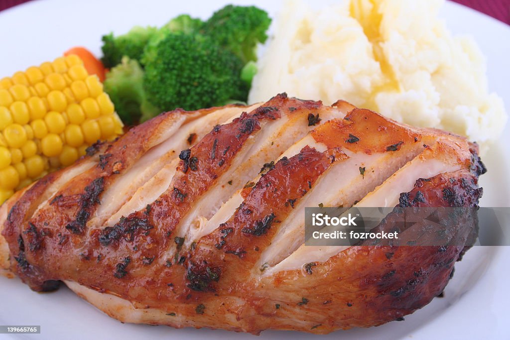 Chicken tonight Fresh hot chicken dinner with vegetables Animal Body Part Stock Photo