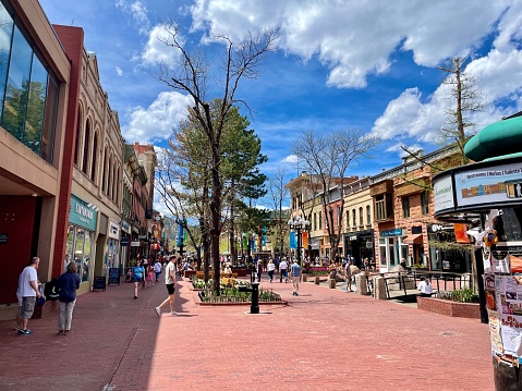 Pearl Street Mall in Boulder Colorado - Is an open air walking mall in the heart of downtown Boulder Colorado. The Pearl Street Mall is home to countless shops and restaurants and exudes the small town vibe of this amazing city.
