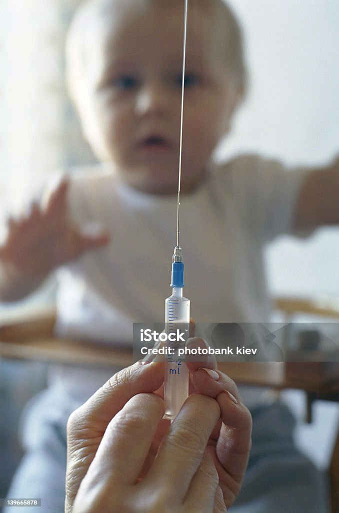 La vaccination bébé - Photo de Bactérie libre de droits