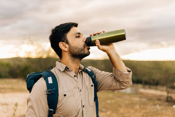 istock Man hiking with backpack and water bottle in Brazilian Caatinga 1396661490