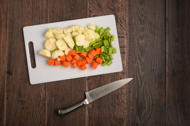 istock Chopped carrots, onion and celery 1396666472