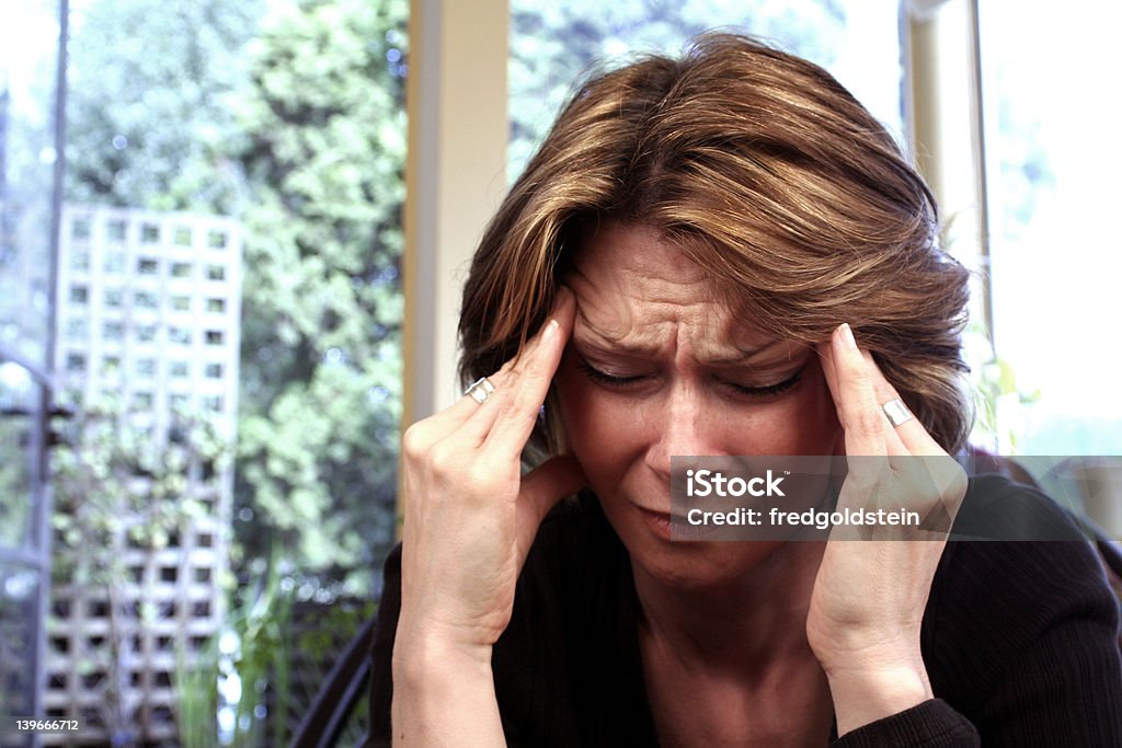 woman in pain Adult Stock Photo