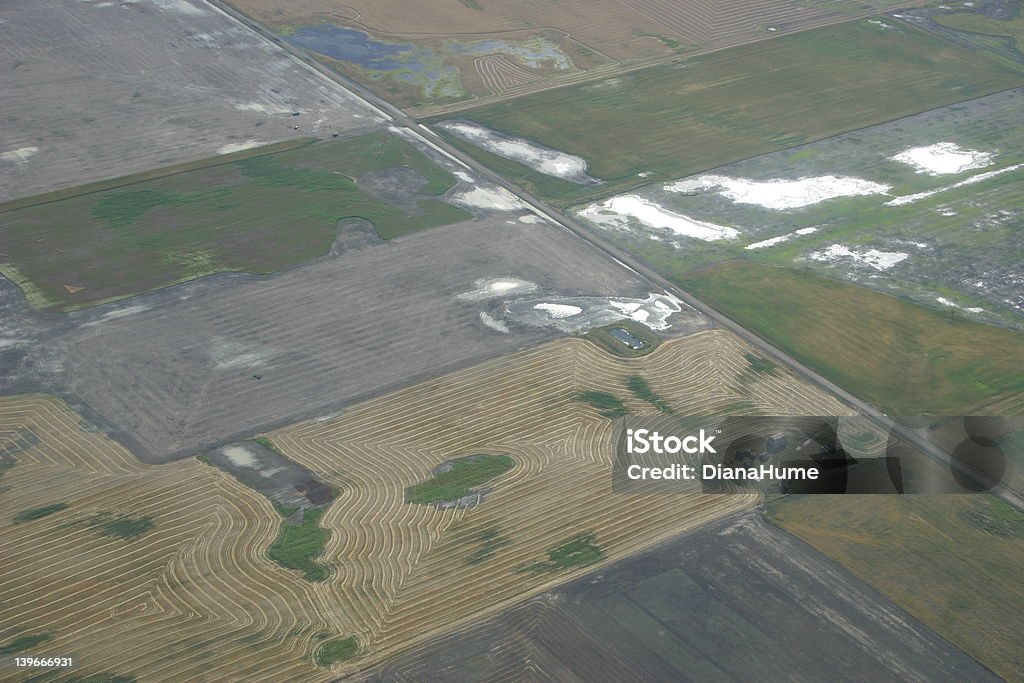 Aerial view field patterns Aerial view of patterns in Saskatchewan fields in spring. Aerial View Stock Photo