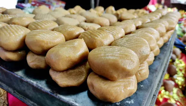 Photo of Row of indian sweets Peda.A Famous sweet desert in mathura in india