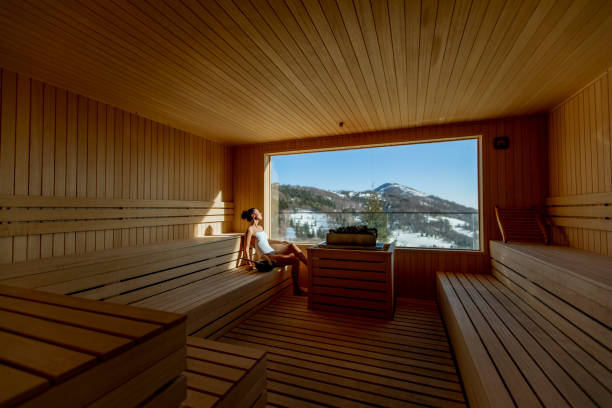 istock Young woman relaxing in the sauna 1396671204