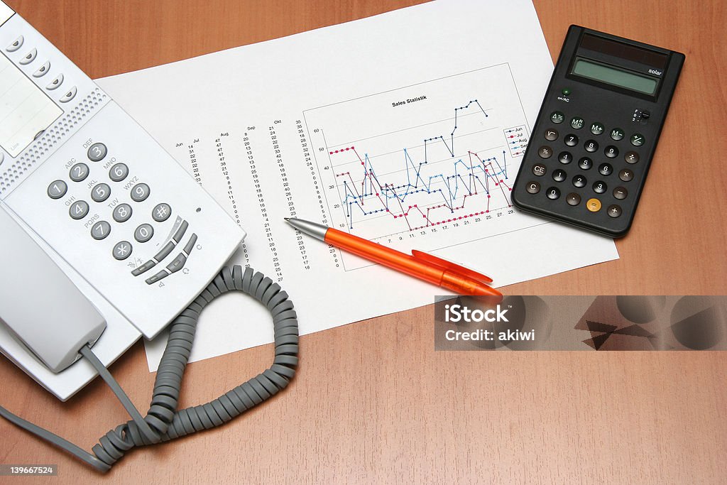 Telefono grafico & calcolatrice - Foto stock royalty-free di Affari