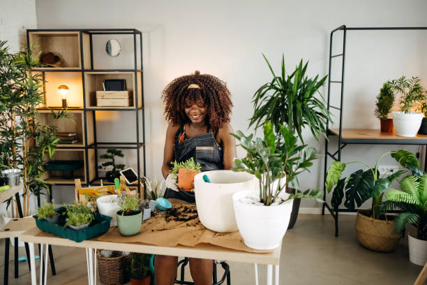 istock Florist Woman Seedling Plants 1396676889