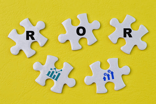 Jigsaw puzzles with text ROR stands for Return on Revenue