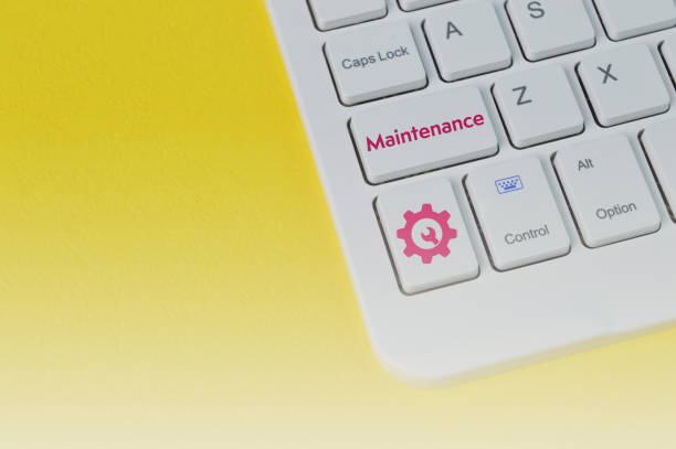 istock Laptop keyboard with text MAINTENANCE and wrench symbol 1396680266