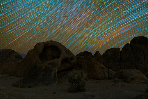 Star Trails over cyclops arch in Alabama Hills