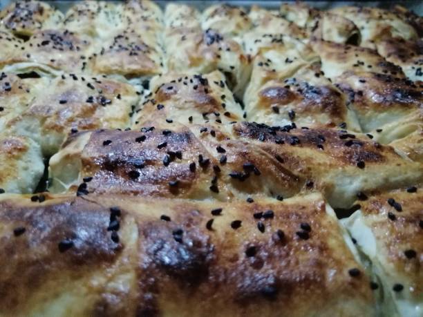 istock Homemade pastry with cheese in tray 1396683967