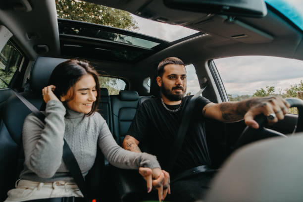 istock couple talking in the car 1396684238