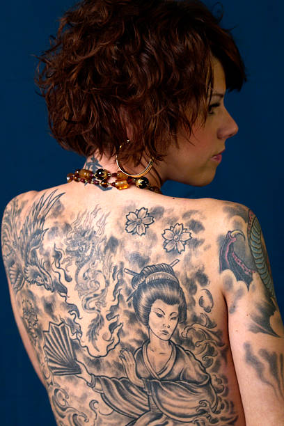 istock Beautifull woman with tattoo 139668424